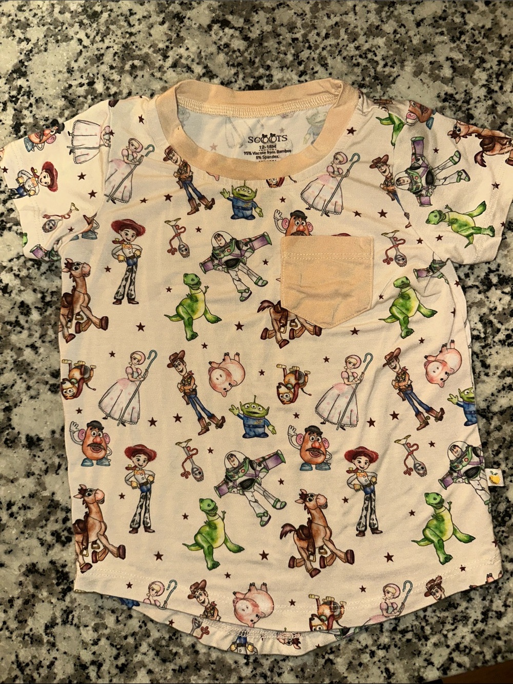 Scoots Disney•Pixar Toy Story Kids' Short Sleeve Character Pocket Tee - Cream